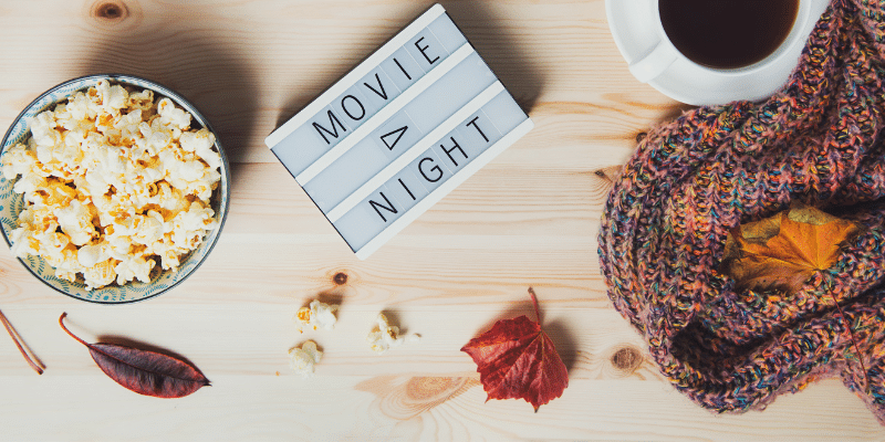 Popcorn and movie night sign
